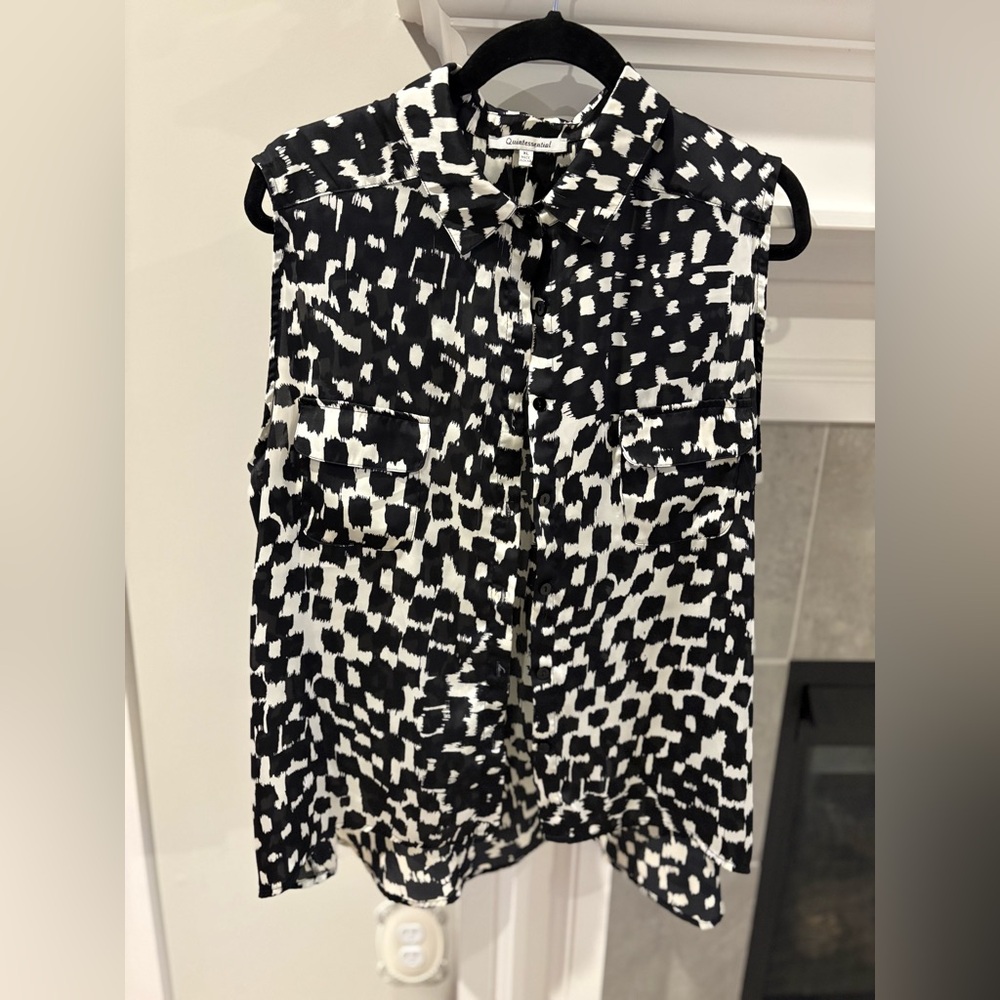 Black and White Sleeveless Blouse